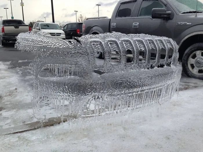 Ice Had Formed Onto A Vehicle, Once Car Was Moved This Was Left Behind