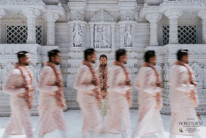 A Clever, Slow-Shutter Shot Of A Groom And His Groomsmen