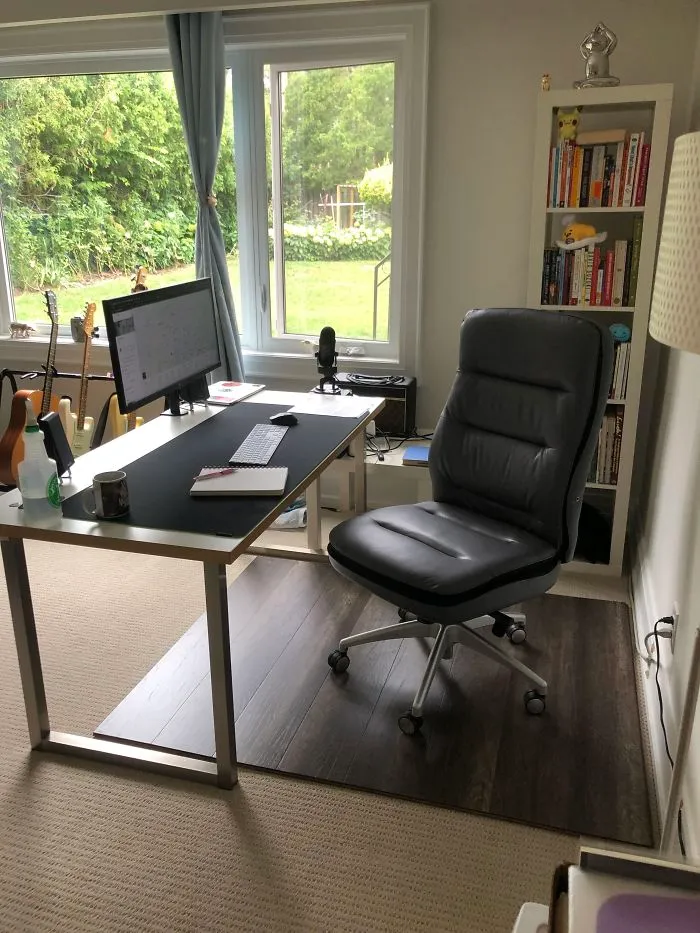 Instead Of Buying Those Cheap Plastic Chair Mats, I Bought A Box Of Laminate Flooring Planks And Put Them Together. Took Less Than 10 Minutes And Feels Sturdy. Chair Rolls So Smooth
