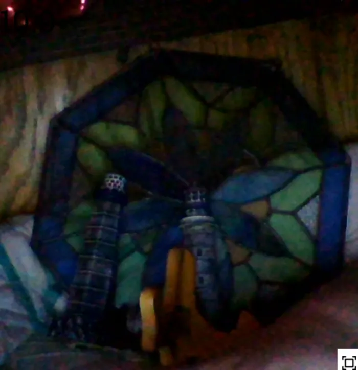 Two Mini Lighthouses, A Stained Glass Artwork Thing And What I Assume To Be A Bookend (They All Came With The House)