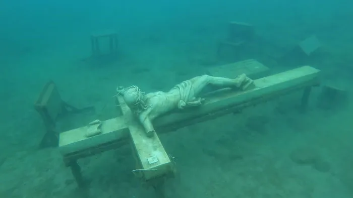 A Statue Of Jesus At The Bottom Of Lake Michigan