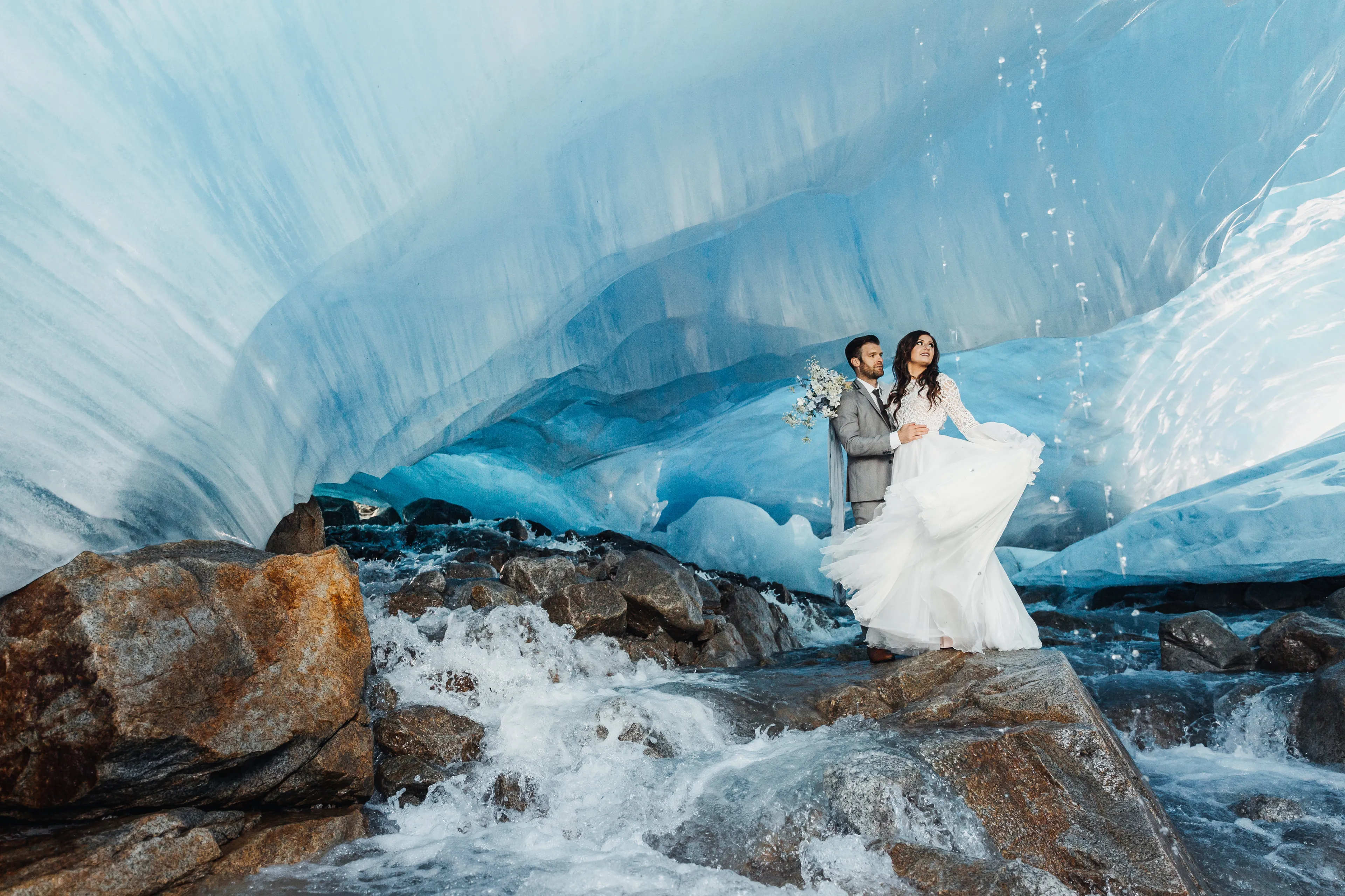Adventurous Couple Posing For A Jaw-Dropping Wedding Photos In Ice Cave!