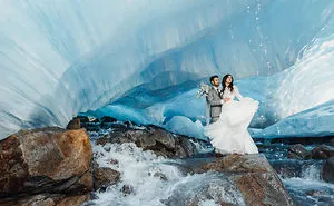 Adventurous Couple Posing For A Jaw-Dropping Wedding Photos In Ice Cave!