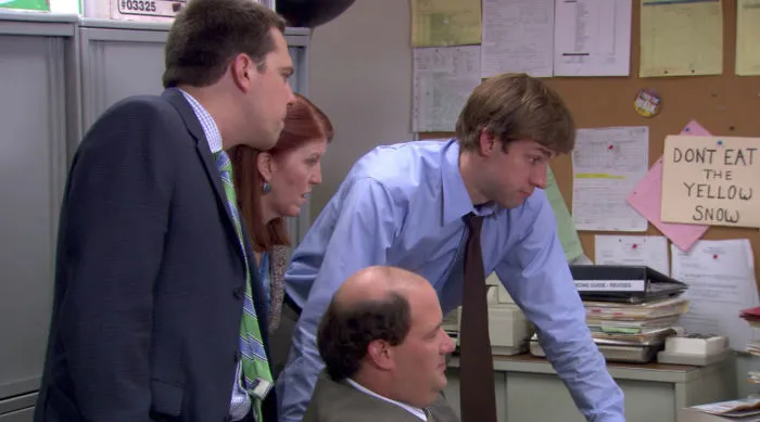 Kevin's Desk Area Had An Important Little Reminder Fixed To The Wall
