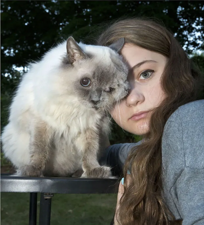Amelia And Her Two Faced Cat