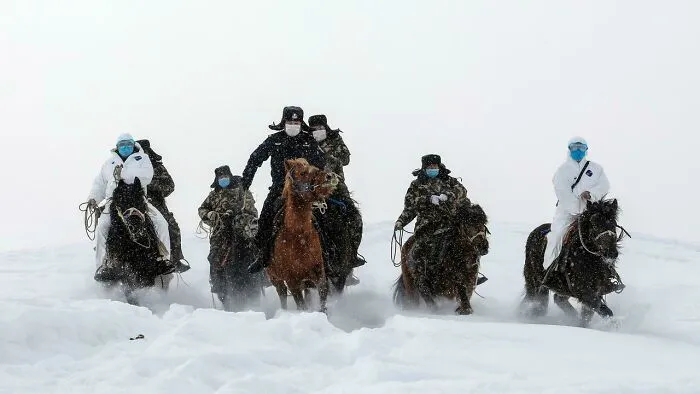 Chinese Policemen Visiting The Remote Region Of Xinjiang To Spread Awareness Of The Coronavirus (2020)
