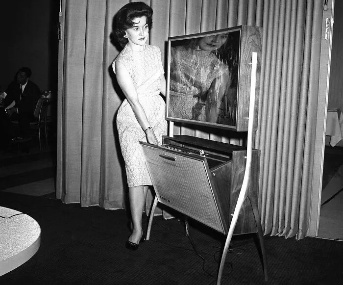 A Thin TV Screen (Only 4 Inches Thick) With An Automatic Timing Device To Record TV Programs For Later Viewing Is The Wave Of The Future As Shown At The Home Furnishings Market In Chicago, Illinois, On June 21, 1961