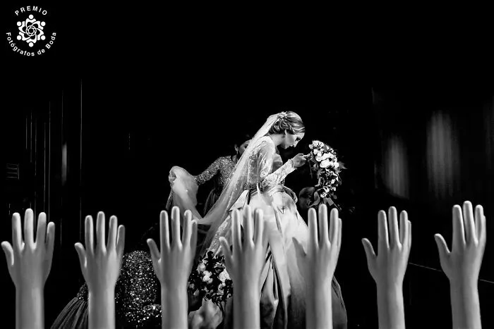 Surreal Bride Among Hands Photographed By Miguel Bolaños