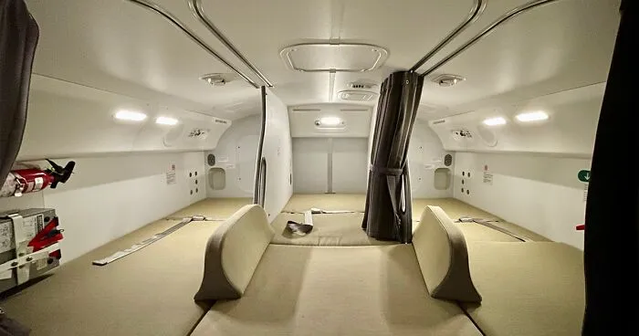Here's What It's Like Inside Your Plane's Hidden "Crew Rest," Where Pilots And Flight Attendants Sleep