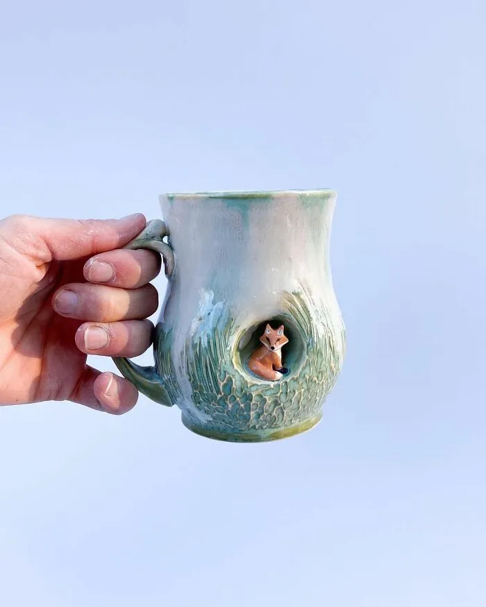 These 31 Brilliant Mugs Have Small Side Nooks Where Tiny Animal Sculptures Live