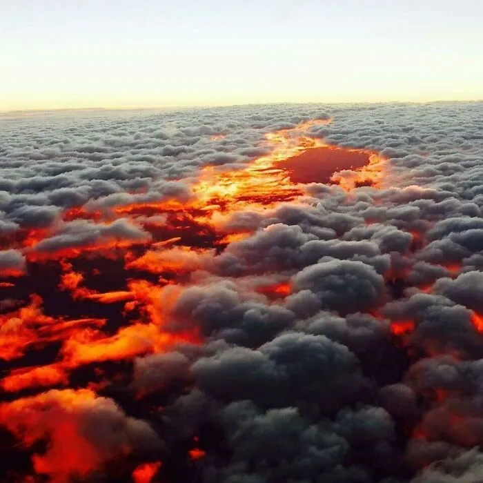 Molten Lava As It Flows Through Rocks