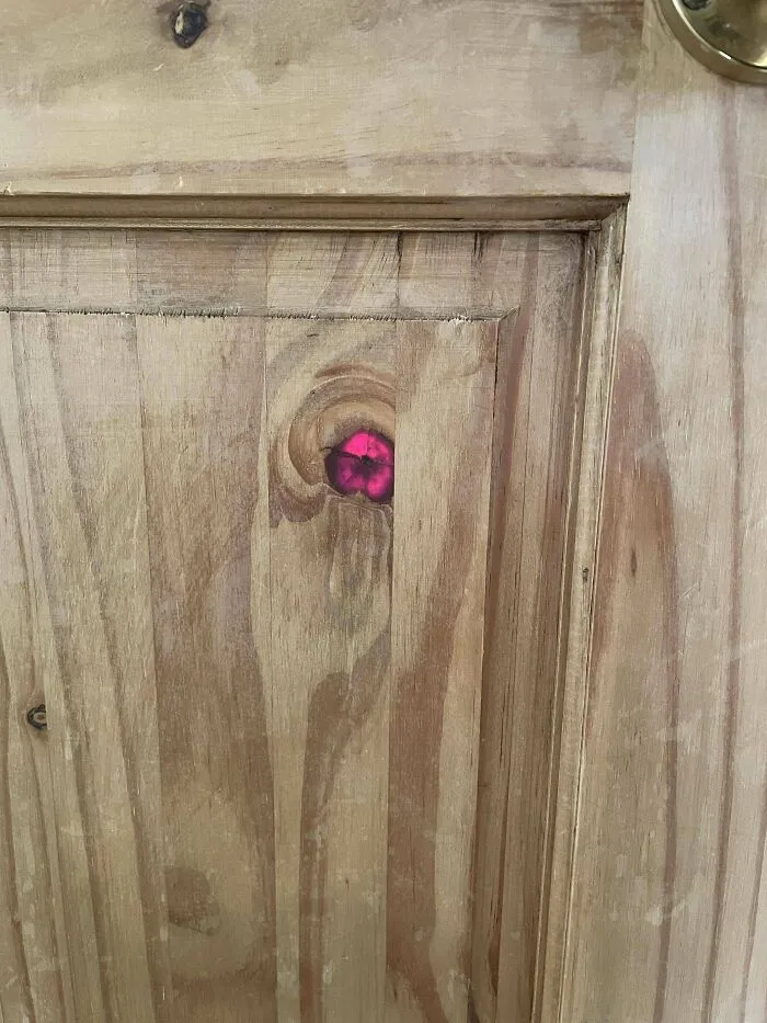 This Knot On Our Door Glows Red When The Sun Shines On The Other Side