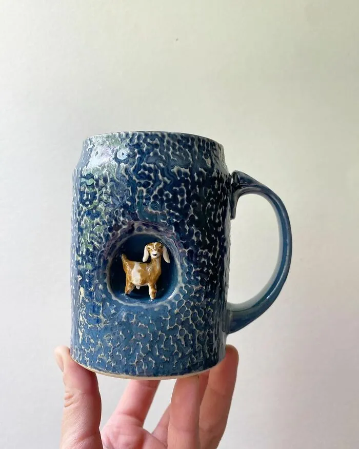 These 31 Brilliant Mugs Have Small Side Nooks Where Tiny Animal Sculptures Live