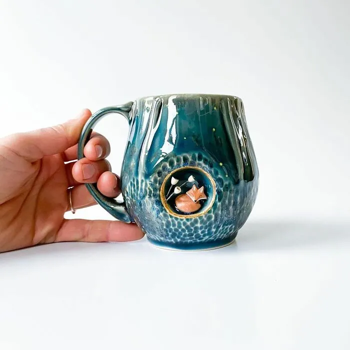 These 31 Brilliant Mugs Have Small Side Nooks Where Tiny Animal Sculptures Live