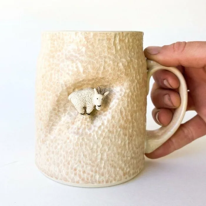 These 31 Brilliant Mugs Have Small Side Nooks Where Tiny Animal Sculptures Live