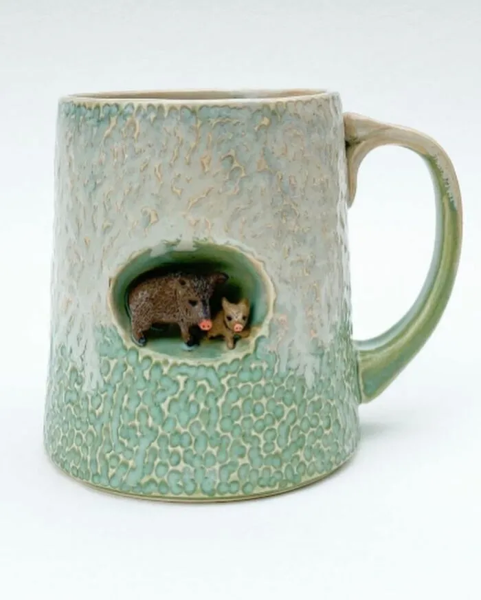 These 31 Brilliant Mugs Have Small Side Nooks Where Tiny Animal Sculptures Live