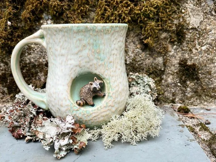 These 31 Brilliant Mugs Have Small Side Nooks Where Tiny Animal Sculptures Live