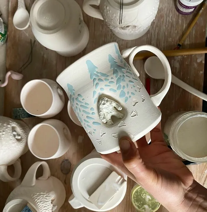 These 31 Brilliant Mugs Have Small Side Nooks Where Tiny Animal Sculptures Live