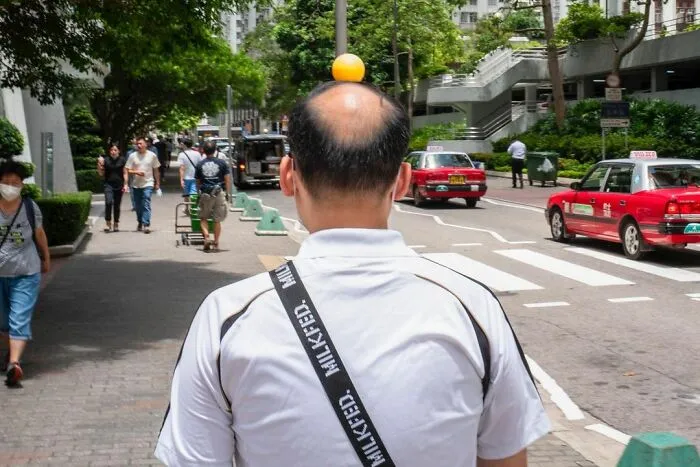 Este fotógrafo callejero capta las oportunidades accidentales en sus fotos (30 imágenes)
