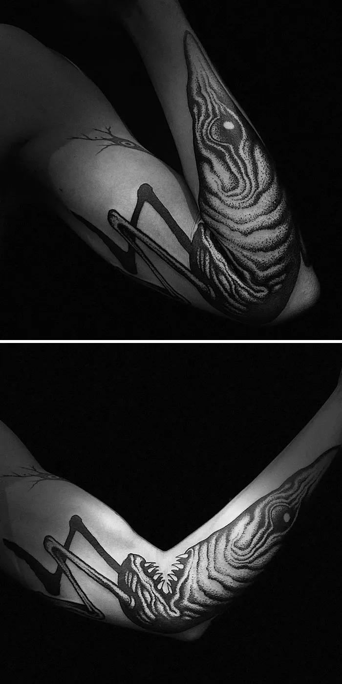 Creative tattoo of a bird on an arm that transforms with movement, showcasing unique tattoo design.