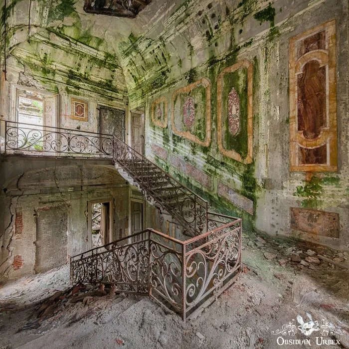 Algae Clings To Crumbling Plaster In This Decaying Italian Villa, Which Overlooks A  Picturesque Lake