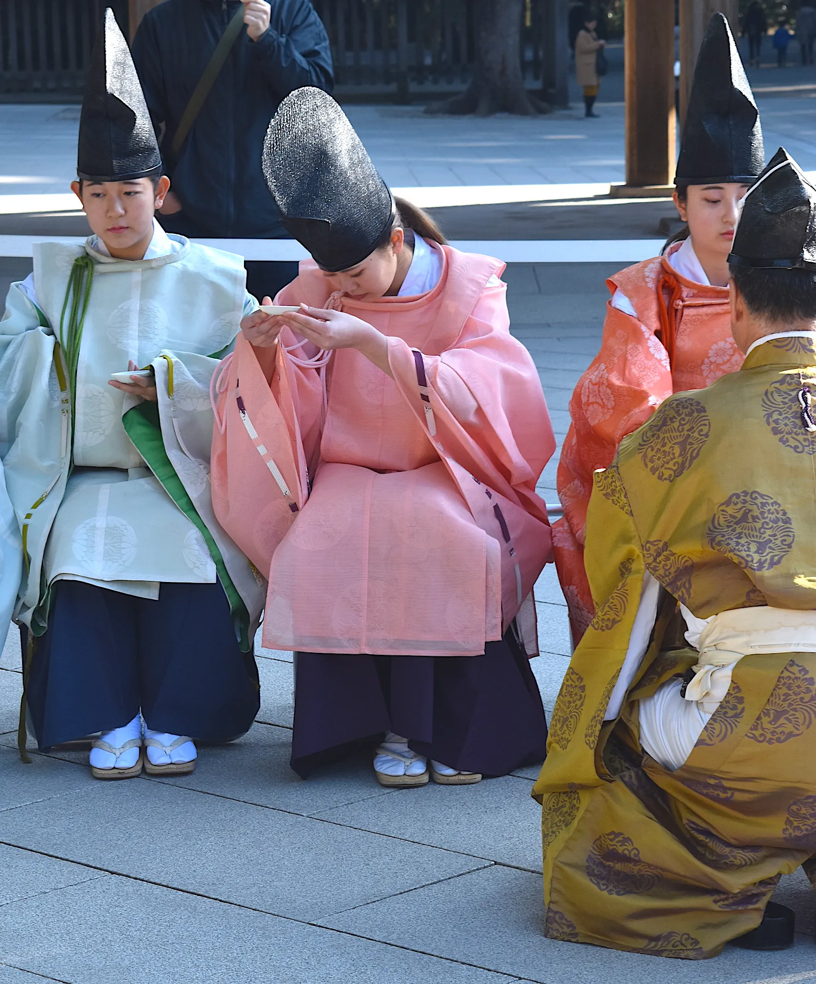 Young Japanese Woman Receiving Sake At A Coming Of Age Ceremony In Tokyo