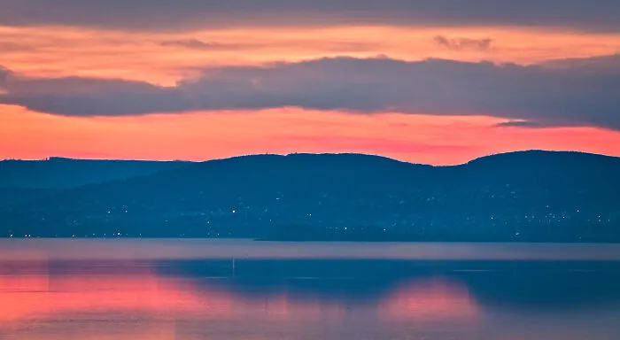 Red Glow Over The Distant Hills