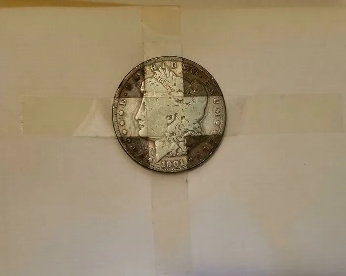 A Coin Taped In My Father's Baby Book Stayed Clean Under The Tape Only