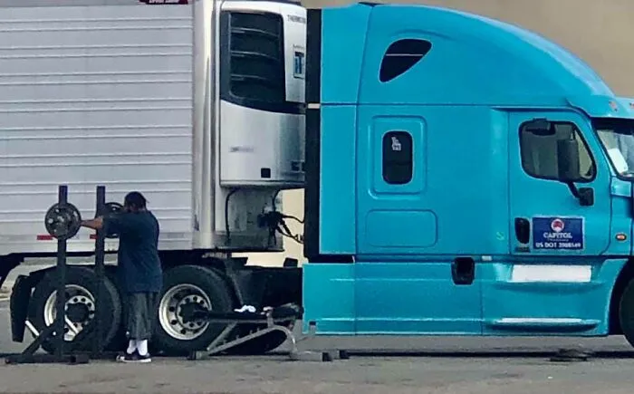 This Trucker Who Takes His Weight Rack With Him To Work Out At Truck Stops Makes No Excuses!