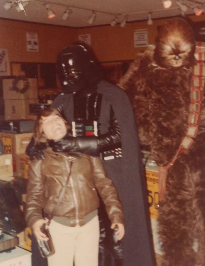 30 Funny And Awkward Pics Of Kids Posing With Superheroes And Popular Characters In The '70s And '80s