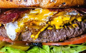Person Starts A Debate Online After Their Vegan Coworker Asks Them To Eat Burger Outside