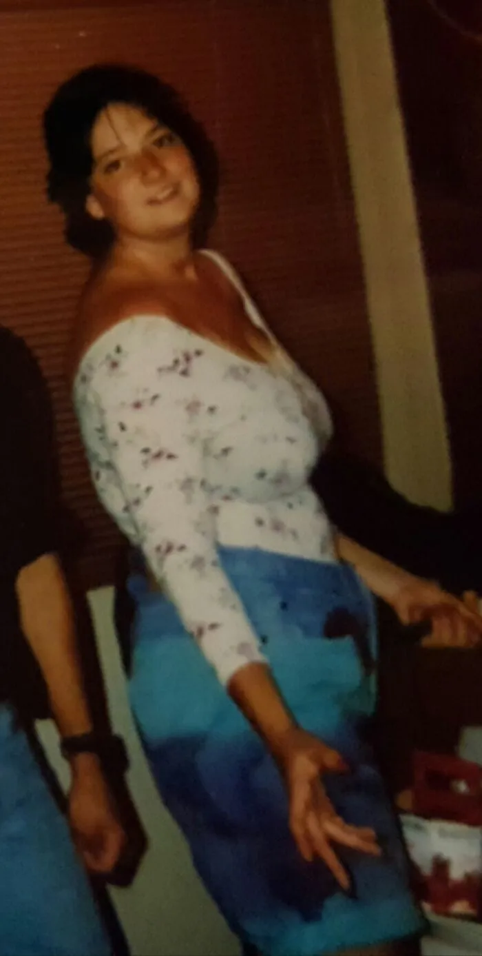 199?. Flower Body Suit & Guess Tie-Die Shorts. It's The Pager In The Pocket That Makes It