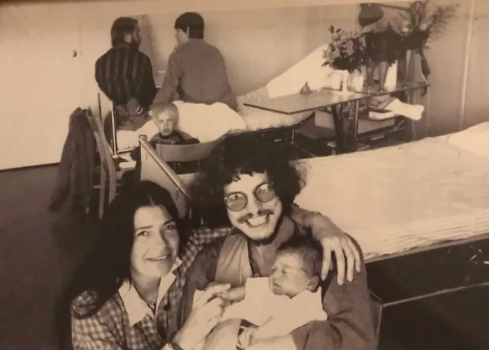 My Parents When I Was Just Born. (Notice The Creepy Ghost Child In The Background)