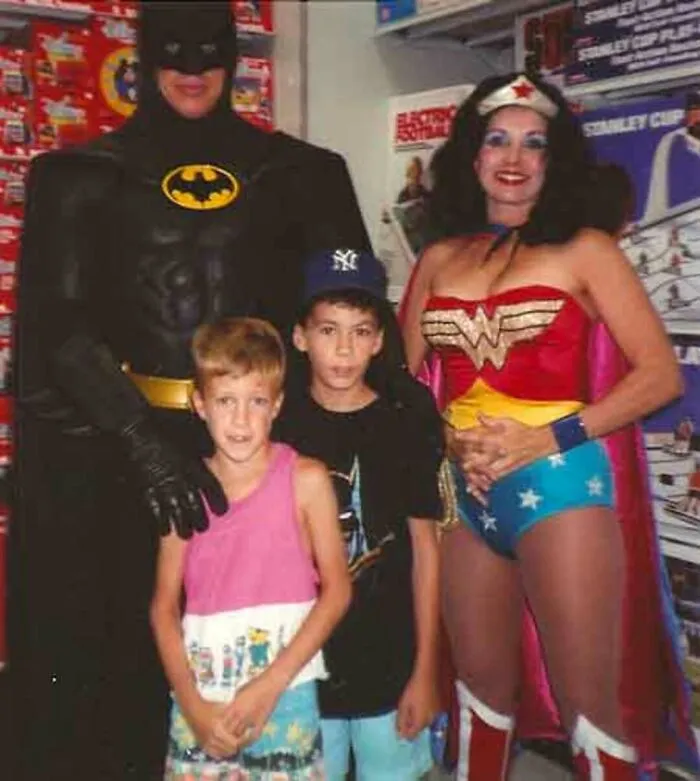 30 Funny And Awkward Pics Of Kids Posing With Superheroes And Popular Characters In The '70s And '80s