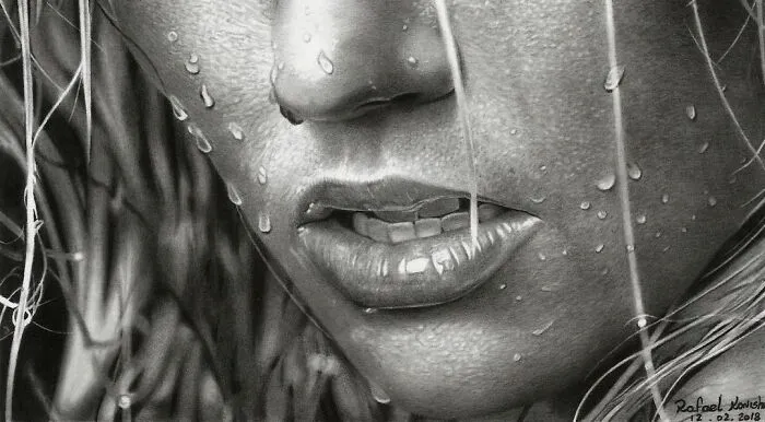 Realistic drawing by Rafael Konishi showing a close-up of a face with water droplets.