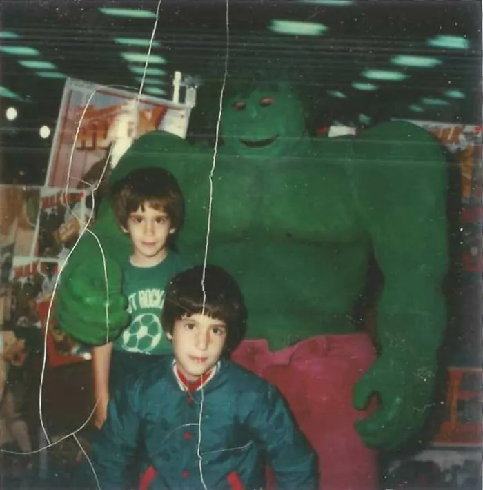 30 Funny And Awkward Pics Of Kids Posing With Superheroes And Popular Characters In The '70s And '80s