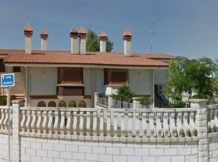 An Excessive Amount Of (Chimneys, Various Vents?) On A House In Castile De Leon, Spain