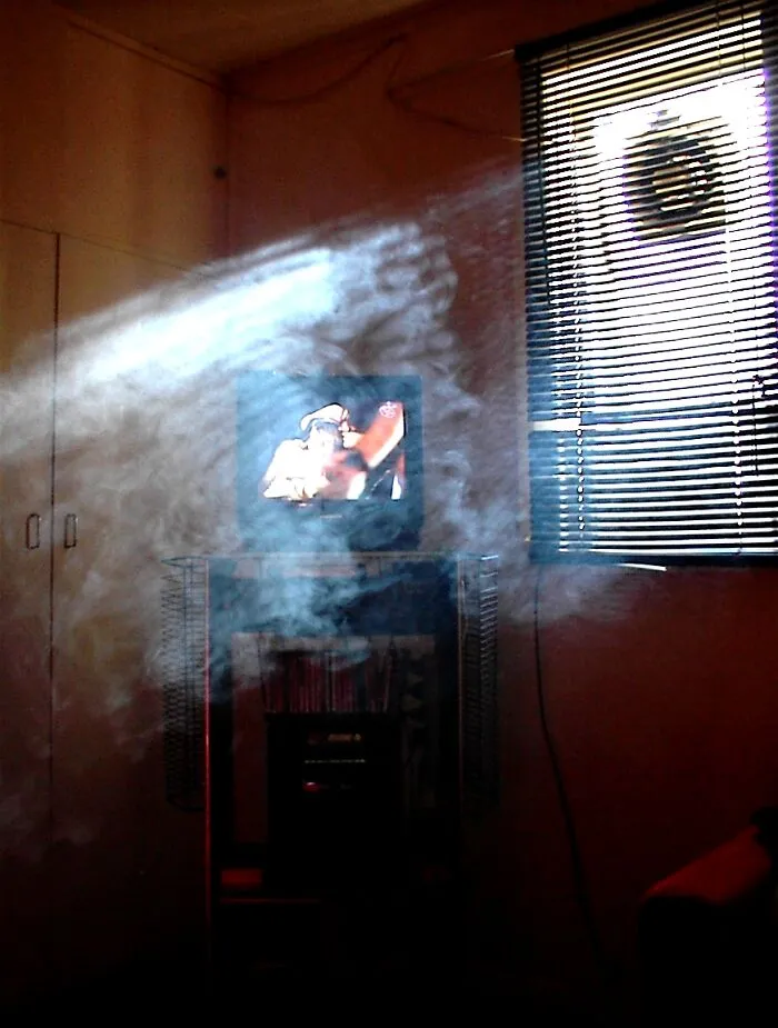 Face In The Smoke Looking Towards The Window