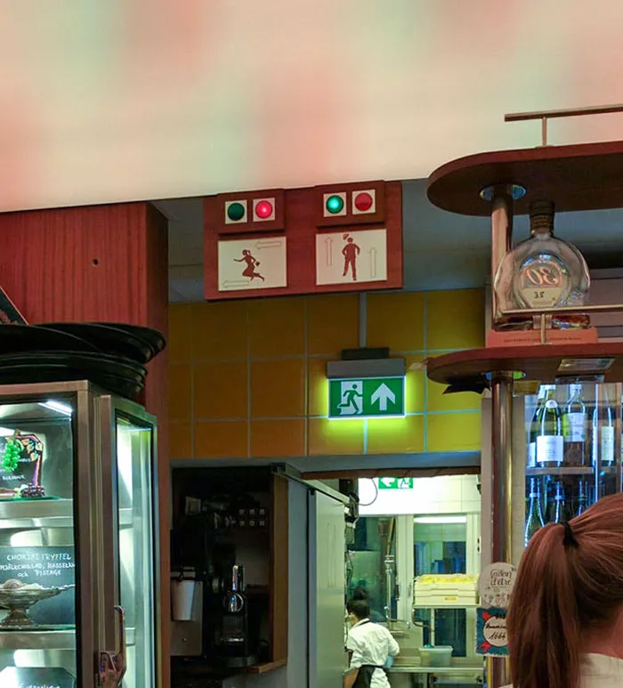 This Café Has Lights Above The Toilet Signs So You Can See If They Are Occupied Without Getting Up