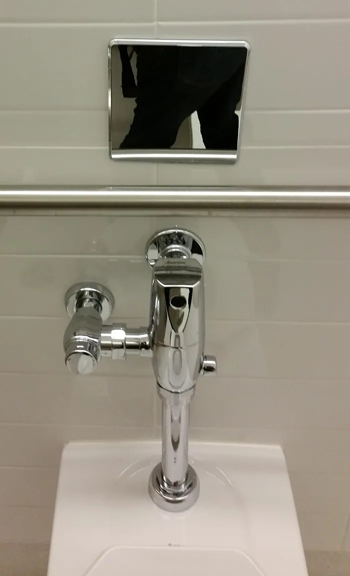 This Bathroom Stall Has A Tiny Mirror So You Can Check Yourself After Wiping