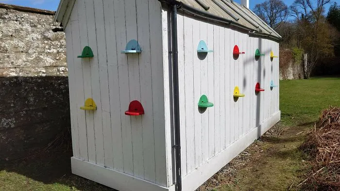 This Building Was Found In A Country Estate In Scotland. It's About The Size Of A Large Shed And Has Small Slits And Platforms On The Outside. What Is It?