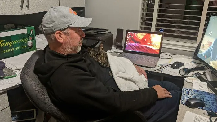 My Father And The Cat That Launched Onto Him At The Shelter 16 Years Ago