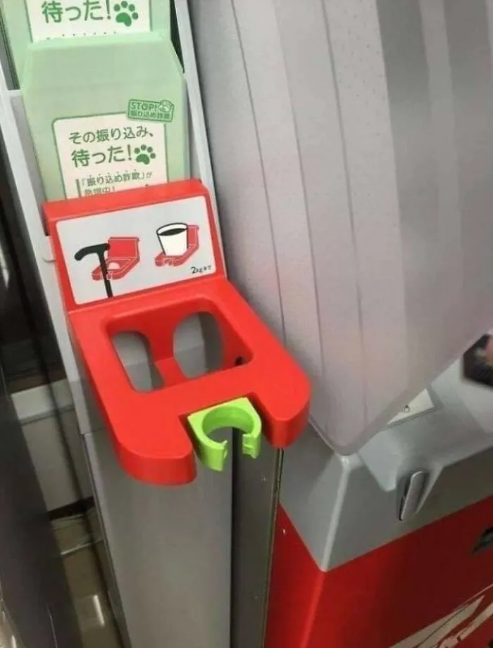 In Japan, You Can Find Cane And Cup Holders Next To An ATM