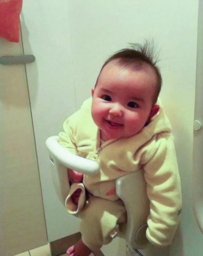 Many Public Toilets Have Baby Holders In The Stalls