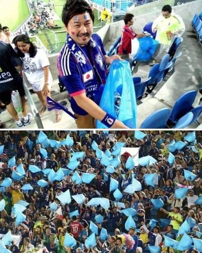 Los fanáticos de fútbol se quedan después del partido para ayudar a limpiar el estadio