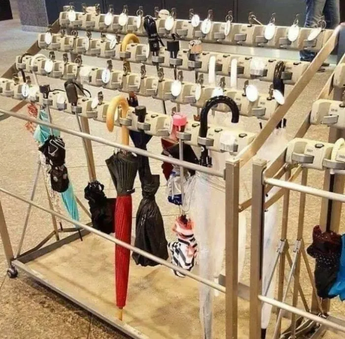 Umbrella lock stand in Japan showcasing unique storage method.