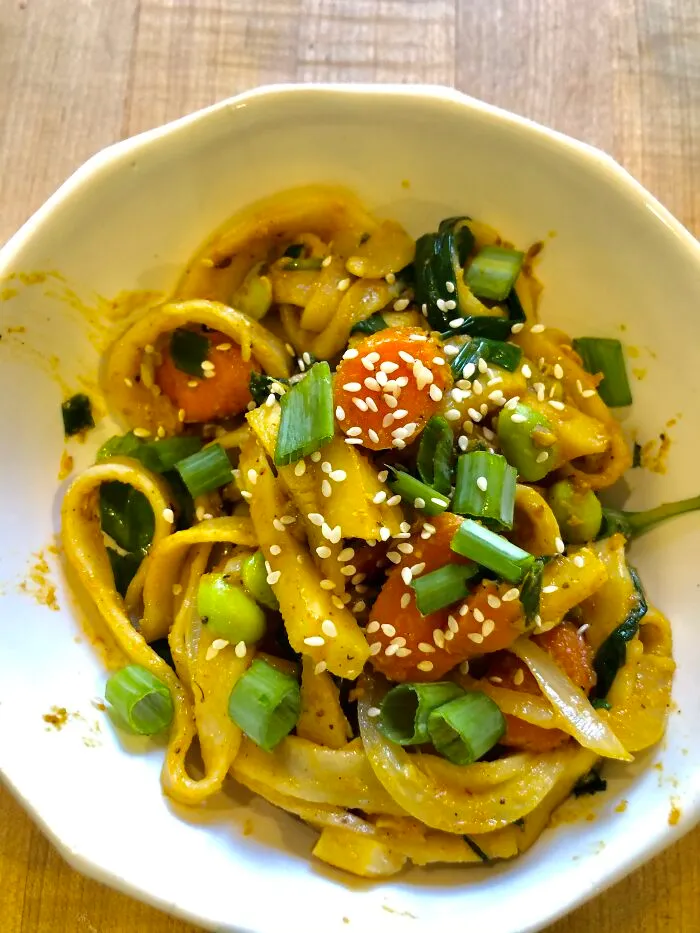 Curried Homemade Udon With Carrots, Edamame, And Parsnips