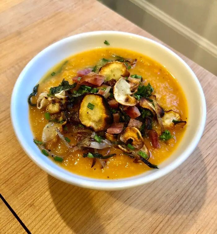 Carrot And Parsnip Soup With A Gremolata Of Bacon, Chives, Parsley And Fried Parsnip And Sage