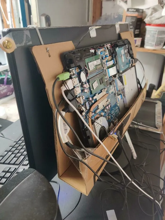 I Took A Free Broken Laptop And Hooked It Up To A Monitor, Used The Monitor Box As The Holder. Been Using It Daily For Almost A Year No Problems