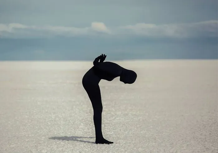 30 Surreal Self-Portraits Wearing Full-Body Suits That Suggest Strangeness, Otherworldliness, And Isolation